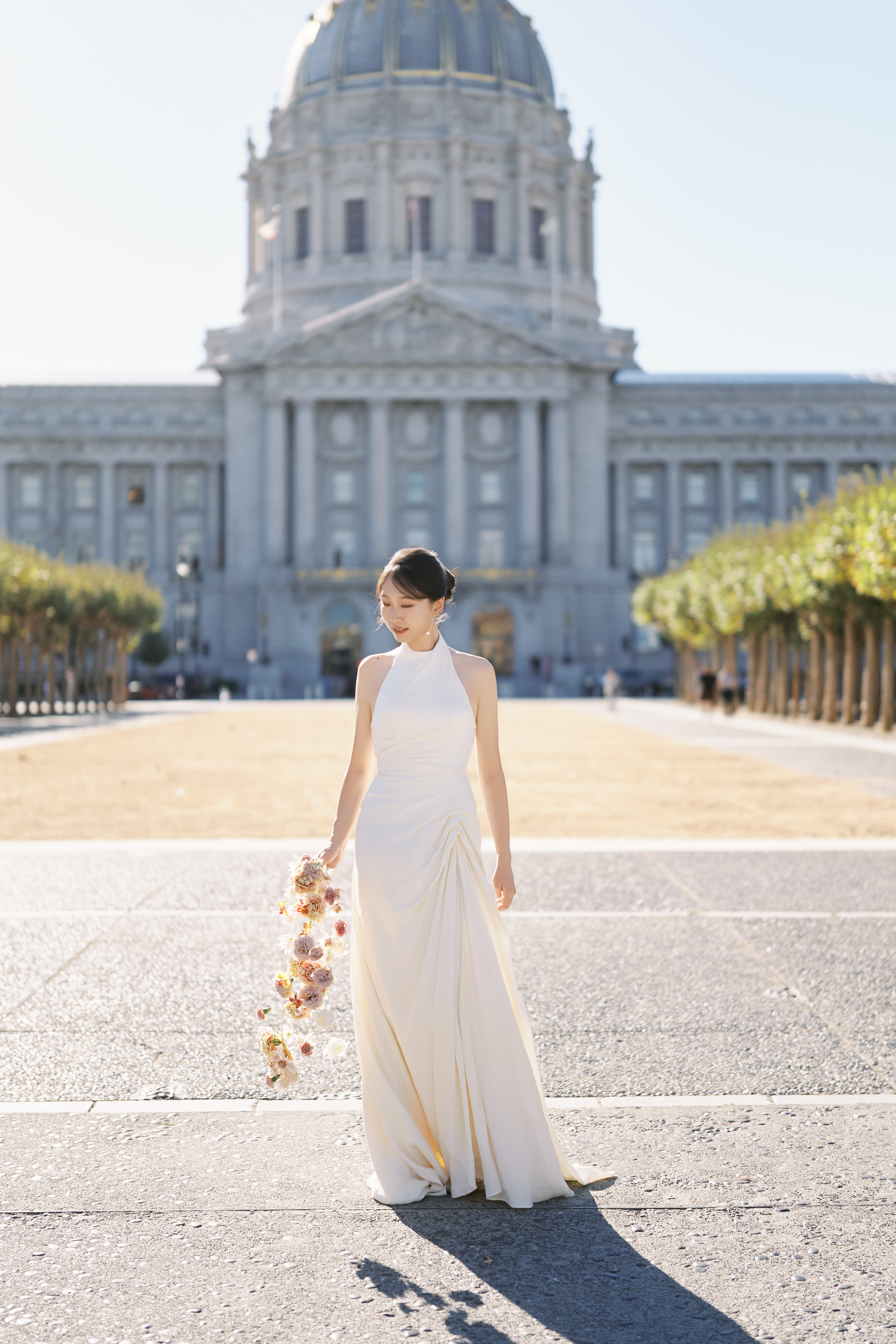 Bride in front of City Hall dome